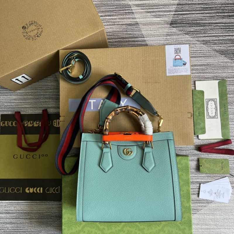 G*u*i top handle bags